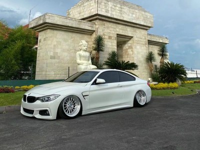Indonesian white BMW 4 series air struts extreme state