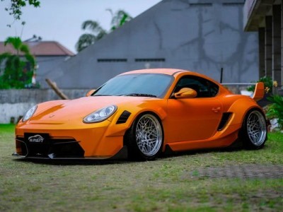 Orange Porsche cayman 987 Airstruts new look