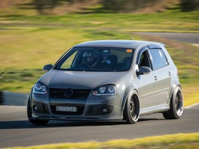 Cement grey Volkswagen Golf MK5  Airstruts Seductive posture