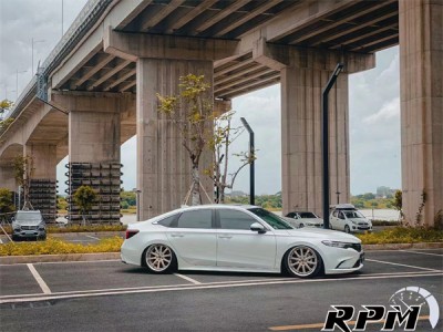 Experiencing the Thrill of Driving: Honda Integra Equipped with Air Strut Suspension System